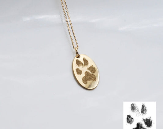 Oval solid 14k yellow gold actual paw print pendant